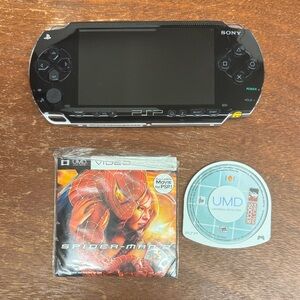 Sony PSP Handheld Console - Black and Silver with 1 game and video